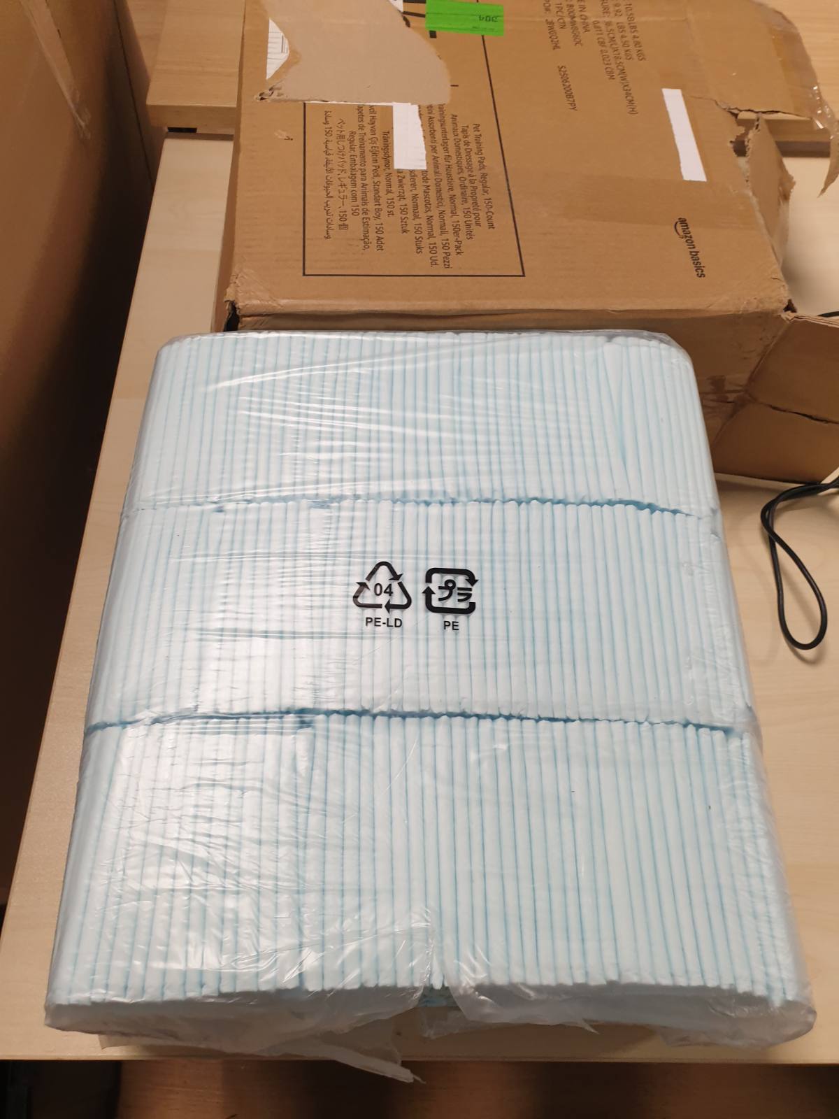 214256 - AMAZON BASICS Mbështjellës për jashtëqitje për qen, 150 copë, 56 x 56 cm, blu