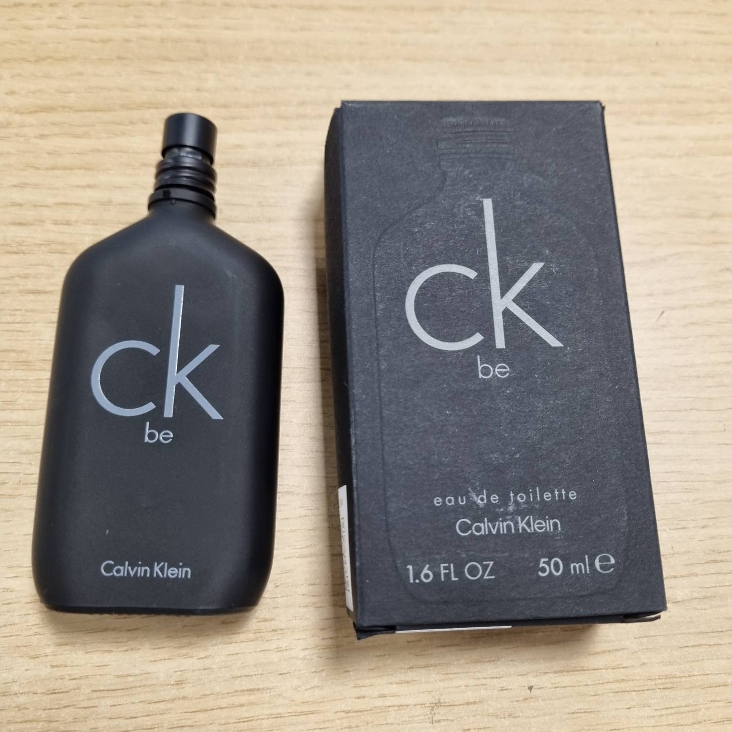 238215 - Calvin Klein CK Be Eau de Toilette - Parfum Woody Unisex – Me nota bergamote, mandarine, dëllinje dhe livandoje