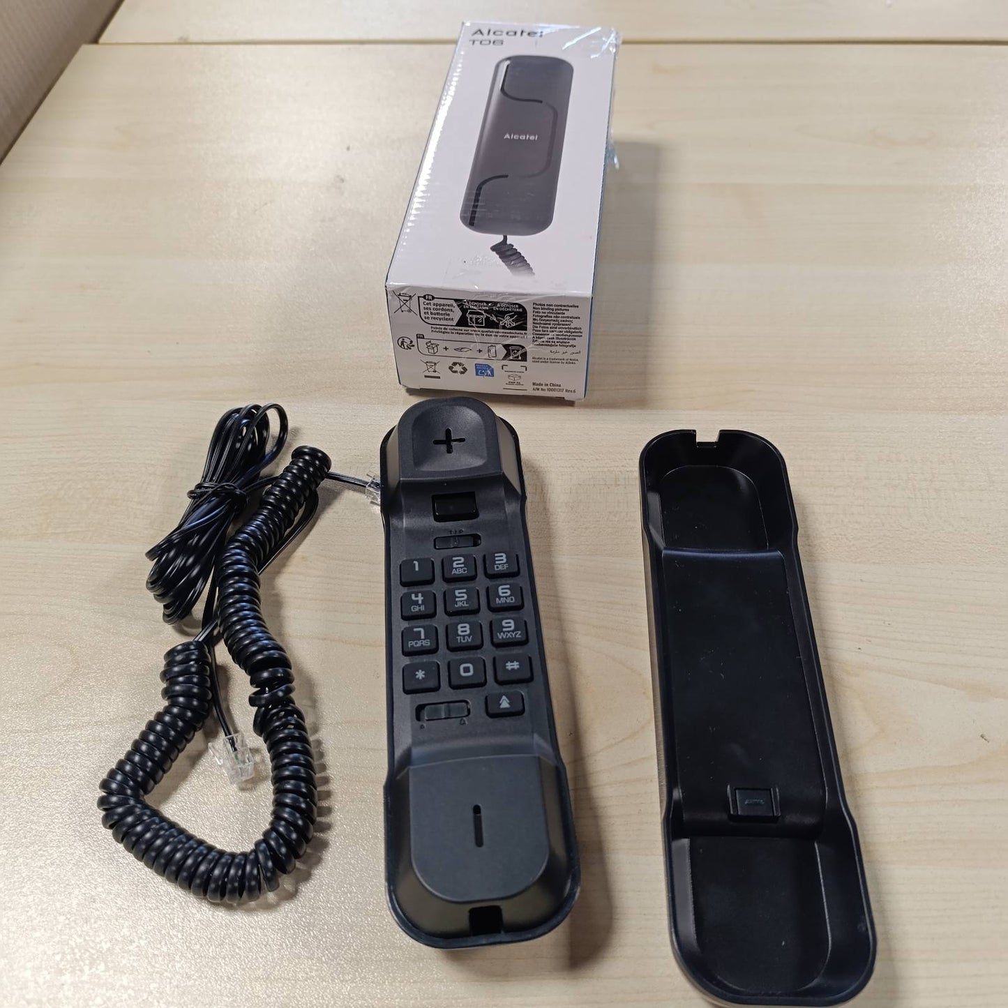 269155 - ALCATEL T06 Telefon fiks me kabllo, Dizajn ultra kompakt, I montueshëm në mur, Buton rinumërimi, Kontroll i volumit të ziles, I zi
