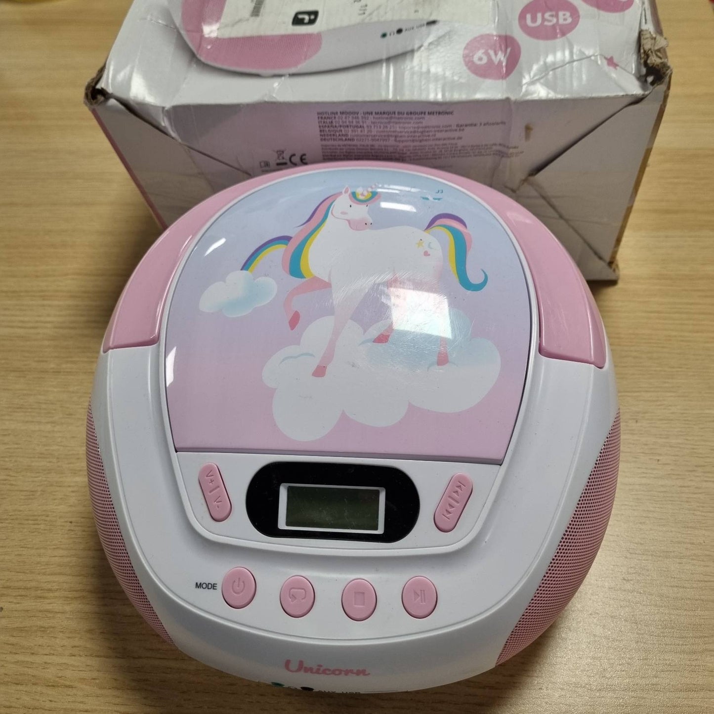 273168 - MOOOV 477407 - Njëbrirësh CD player për fëmijë - MP3 player - Portë USB - Hyrje AUX - Prizë kufjesh - Player portativ me dorezë mbajtëse - Energji elektrike ose me bateri - Rozë dhe të bardhë