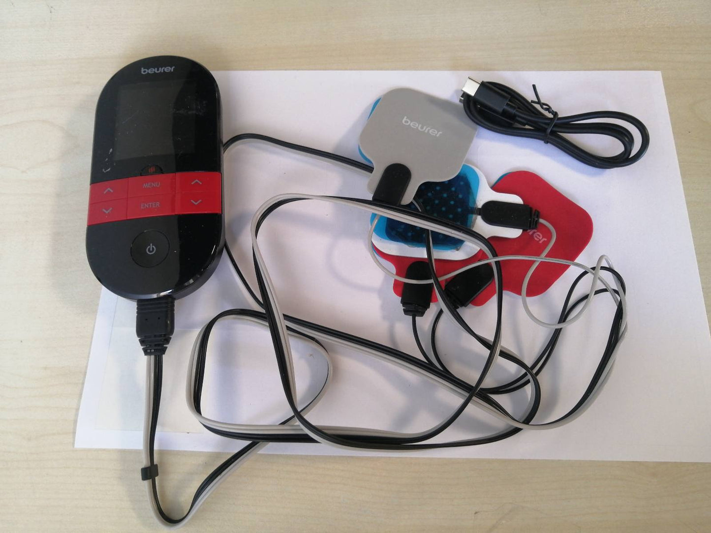 274974 - BEURER Pajisja dixhitale TENS/EMS EM 59 Heat, 4-në-1, për terapi dhimbjeje, stimulim muskujsh, masazh dhe terapi me nxehtësi, përfshin 4 elektroda dhe bateri