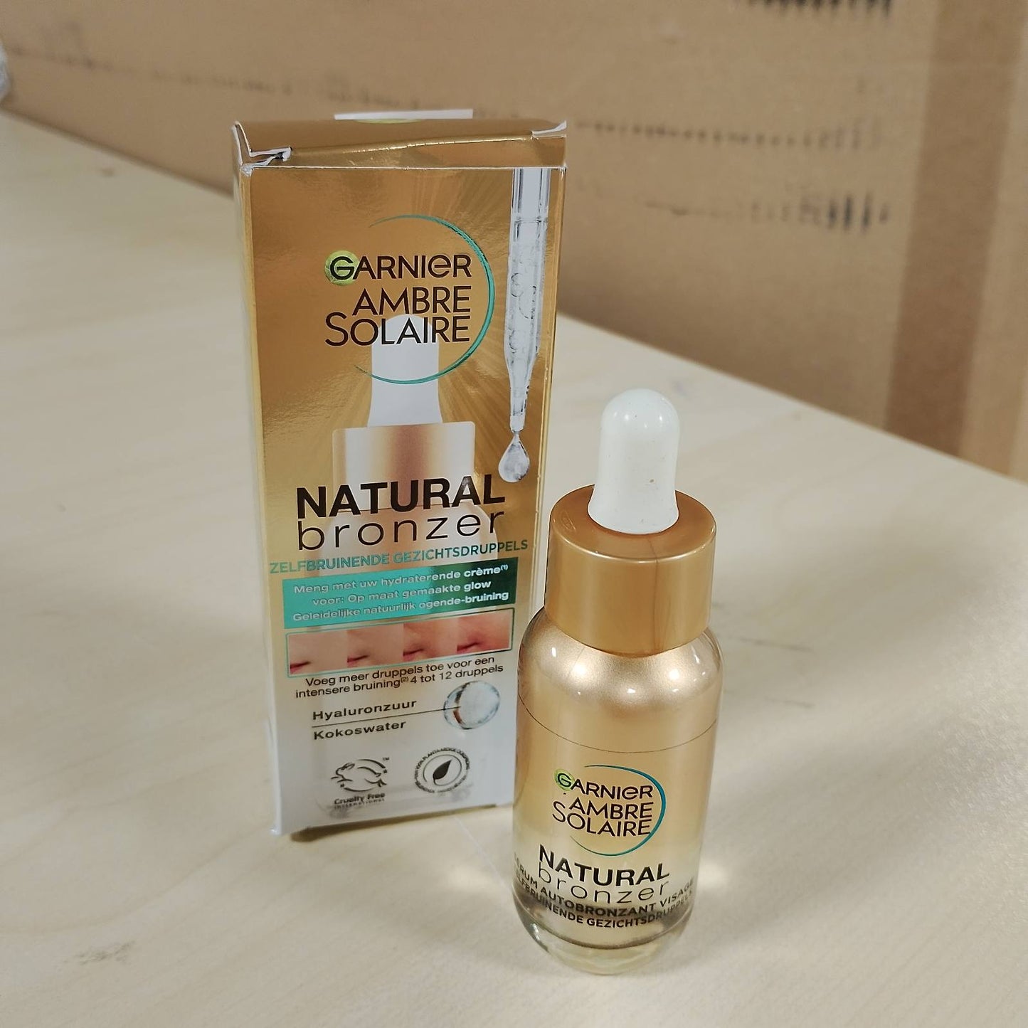 275726 - GARNIER Ambre Solaire Serum hidratues për fytyrën vetë-nxirës, 30ml, Ujë kokosi dhe acid hialuronik, Për të gjitha llojet e lëkurës