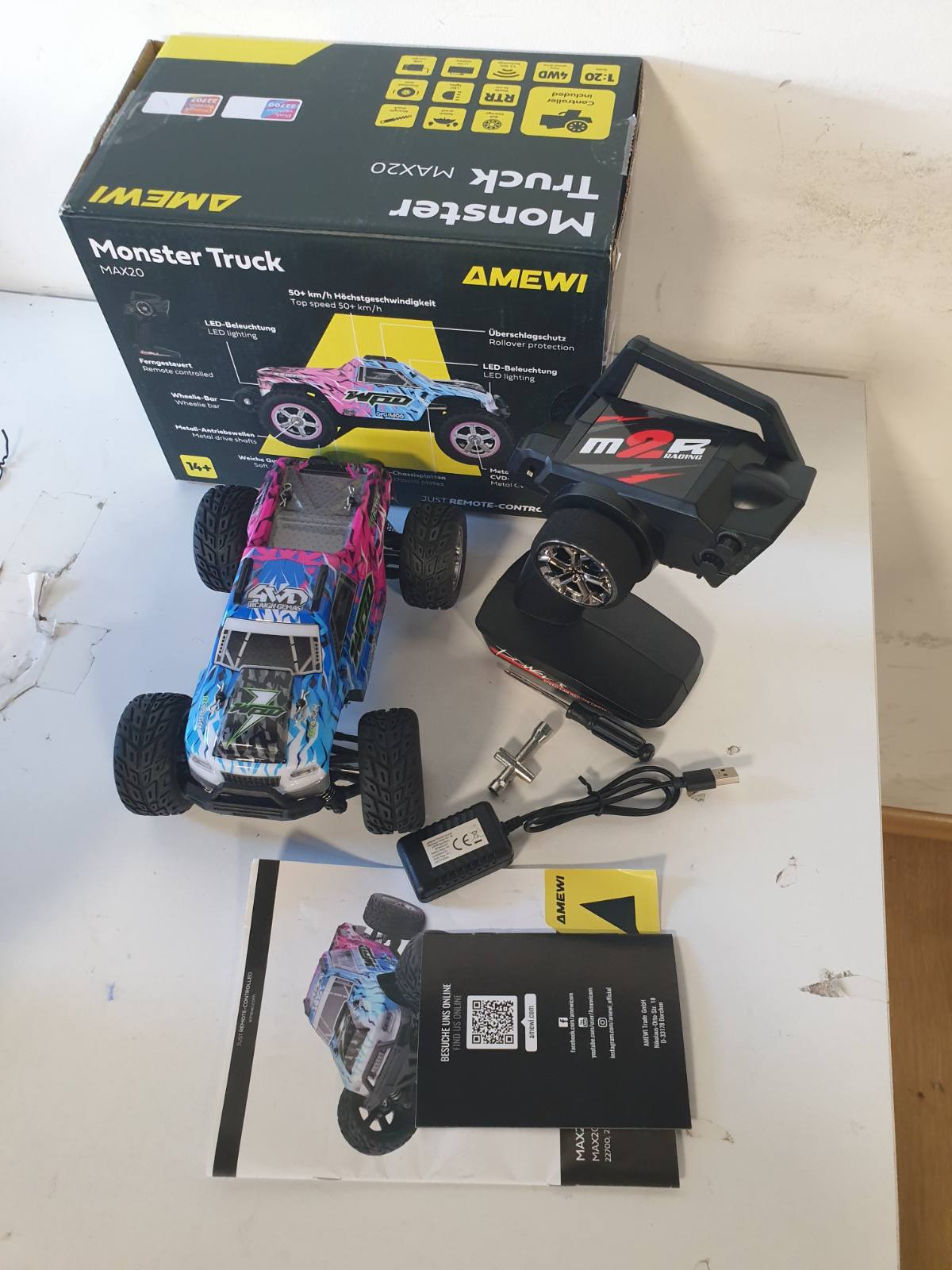 292481 - AMEWI MAX20 Monster Truck i furçuar, 50 km/h, 4WD, 1:20 RTR, Blu/Rozë me telekomandë