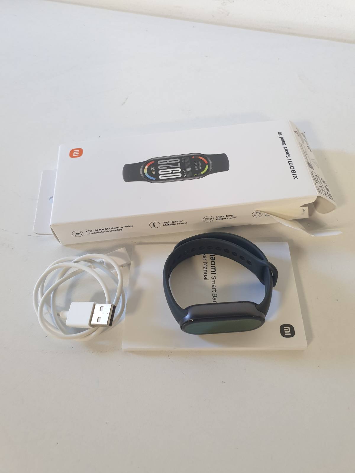 292893 - XIAOMI SMART BAND 10 - Orë inteligjente, Gjurmues fitnesi, Ekran AMOLED 1.72", Jetëgjatësi baterie 21 ditë, Rezistencë ndaj ujit 5ATM, Monitorim i SpO₂ dhe rrahjeve të zemrës, Gjurmim gjumi, Mbi 150 Modalitete sportive, E zezë