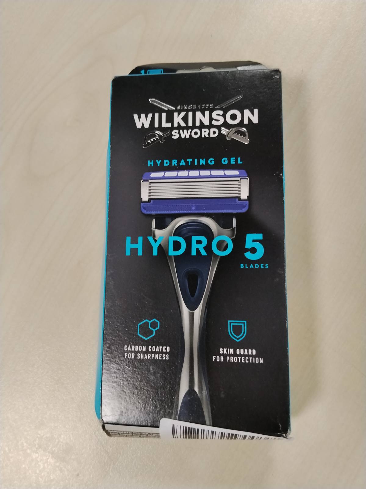 321889 - WILKINSON SWORD Brisk Hydro 5 për burra, dorezë brisku + 1 teh brisku, pishina xheli hidratues