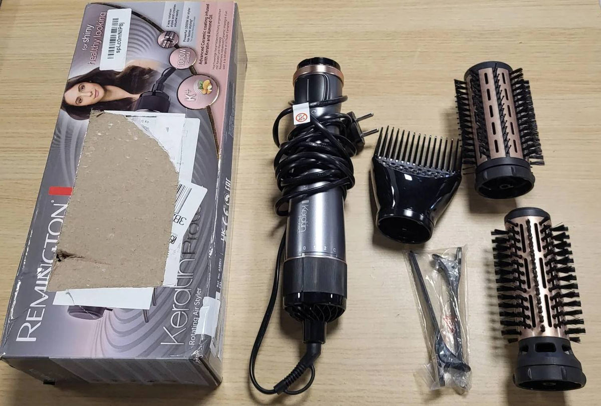 301812 - REMINGTON Furçë me Ajër të Nxehtë Rrotulluese, Mbrojtëse Keratini, 3 aksesorë (2 furça të rrumbullakëta + përforcues rrënjësh), kapëse flokësh, veshje qeramike me vaj bajamesh, AS8811, Gri