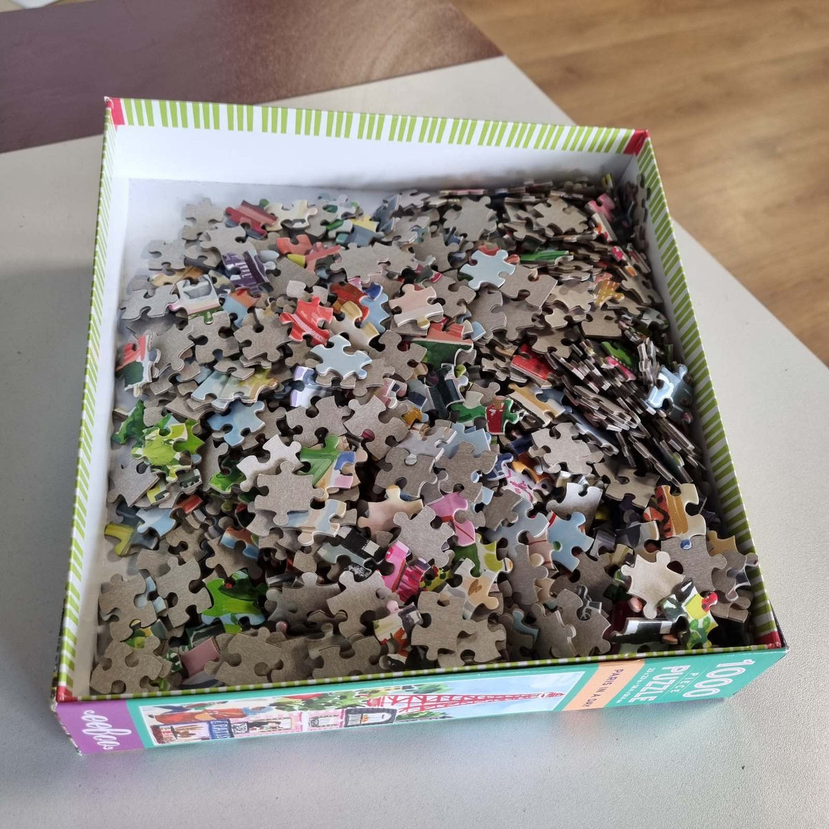298293 - EEBOO Paris in a Day 1000 Cube Puzzle Art
