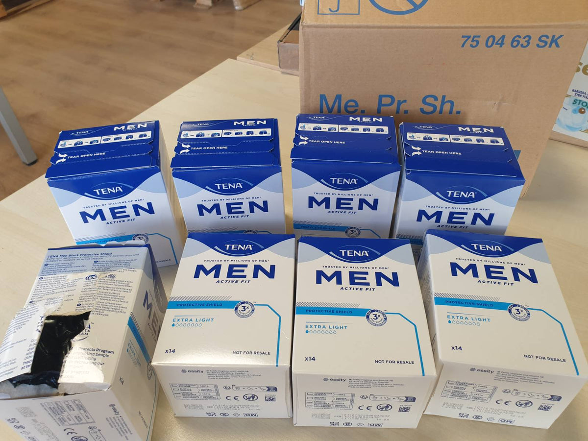 298011 - TENA MEN Protective Shield Extra Light, 112 peceta, 8 x 14 cm, të mbështjella individualisht, e zezë