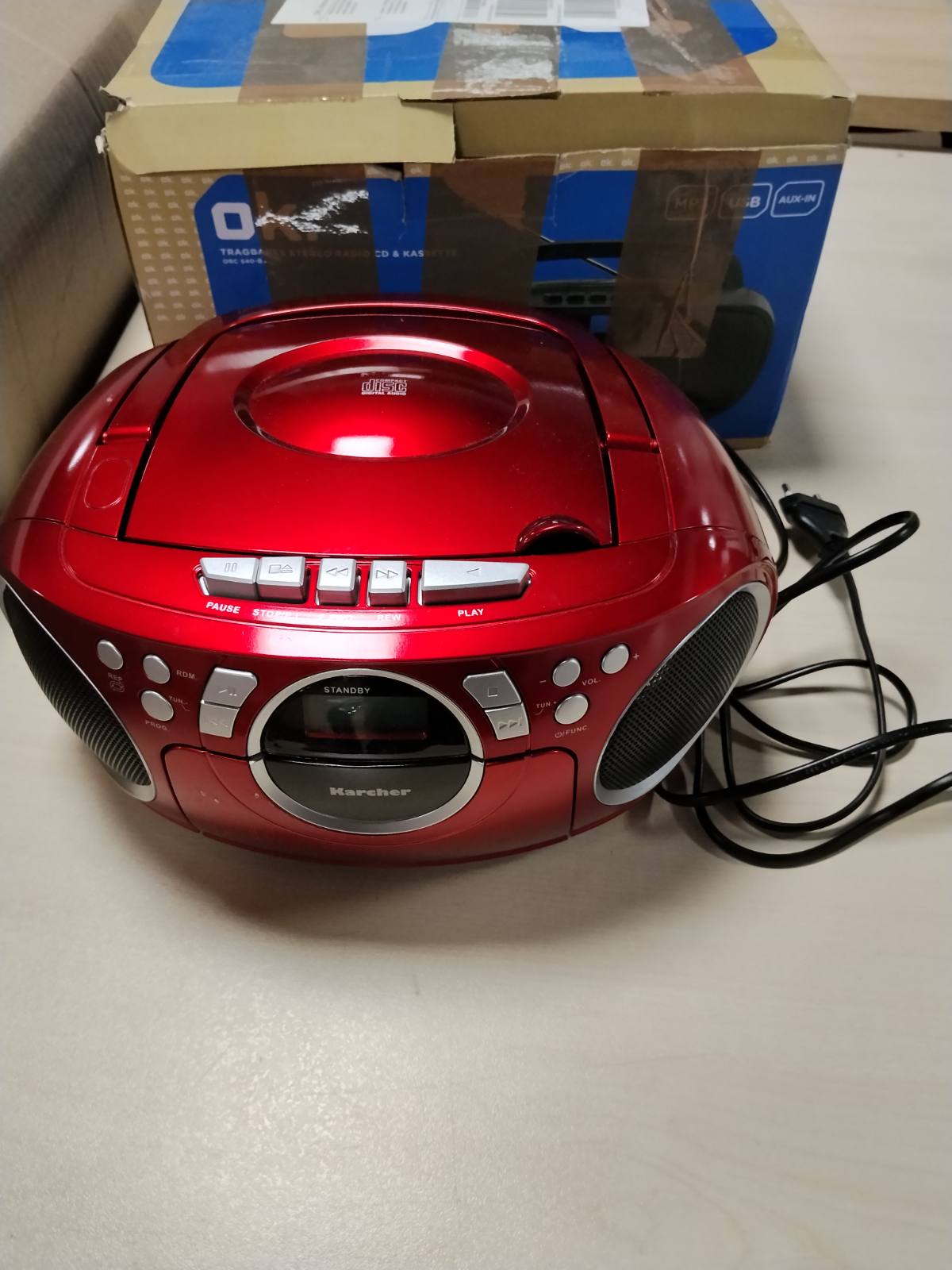 295157 - KARCHER Radio/boombox portativ me CD Karcher RR 5042-R me CD player dhe kasetofon (FM, funksionim me bateri/rrjet, AUX-In) e kuqe