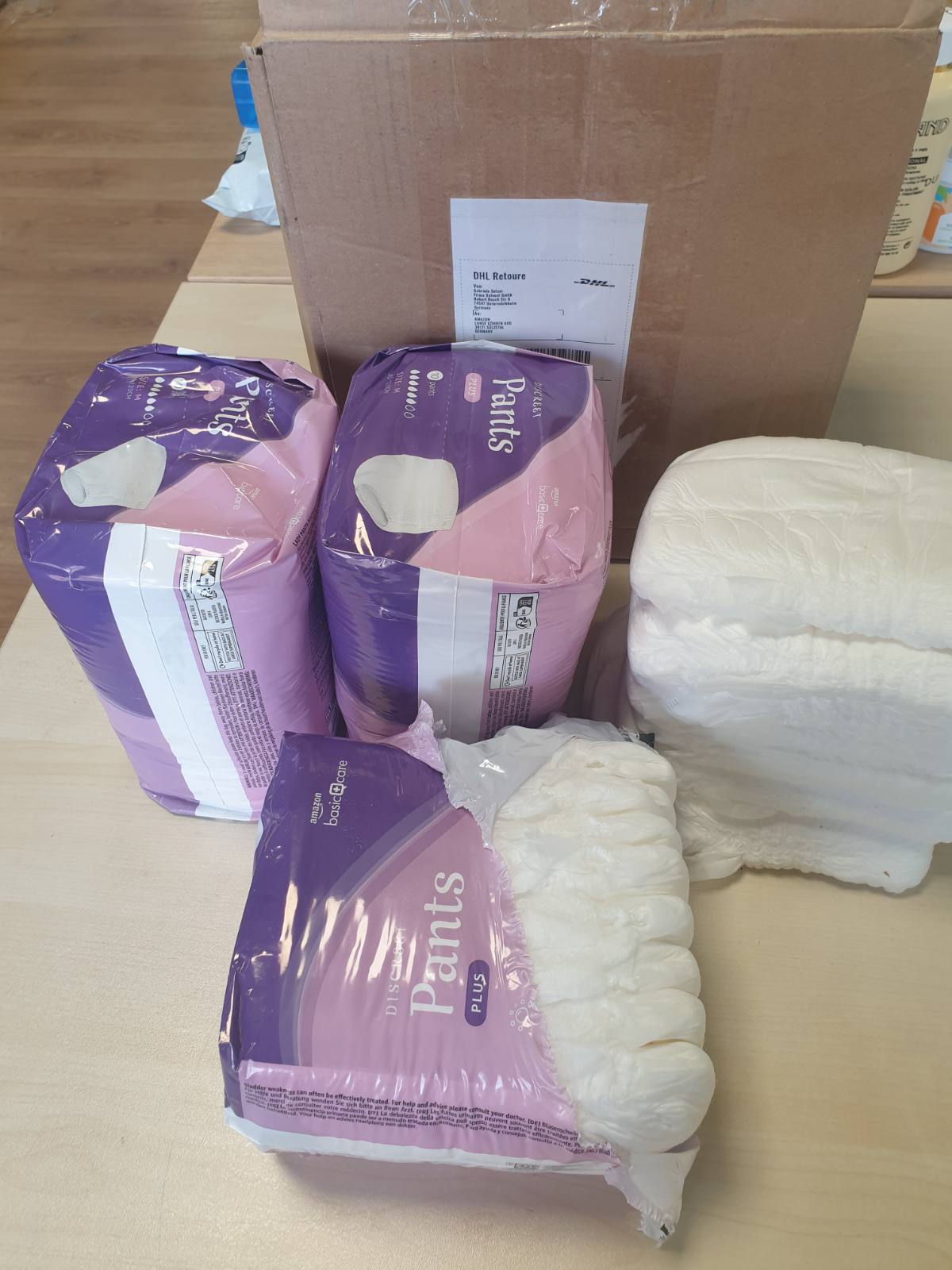 321170 - HEALTHCARE Pantallona për femra nga Amazon, Plus Medium, 40 copë (4 pako me 10 copë), e bardhë