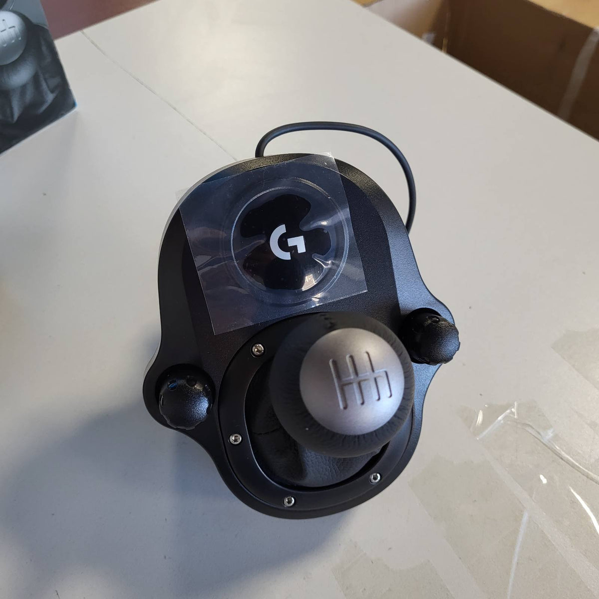 319823 - LOGITECH Ndërruesi i marsheve G Driving Force, 6 shpejtësi, dorezë lëkure origjinale, kapëse montimi, i pajtueshëm me rrotat G29, G920, G923 - e zezë