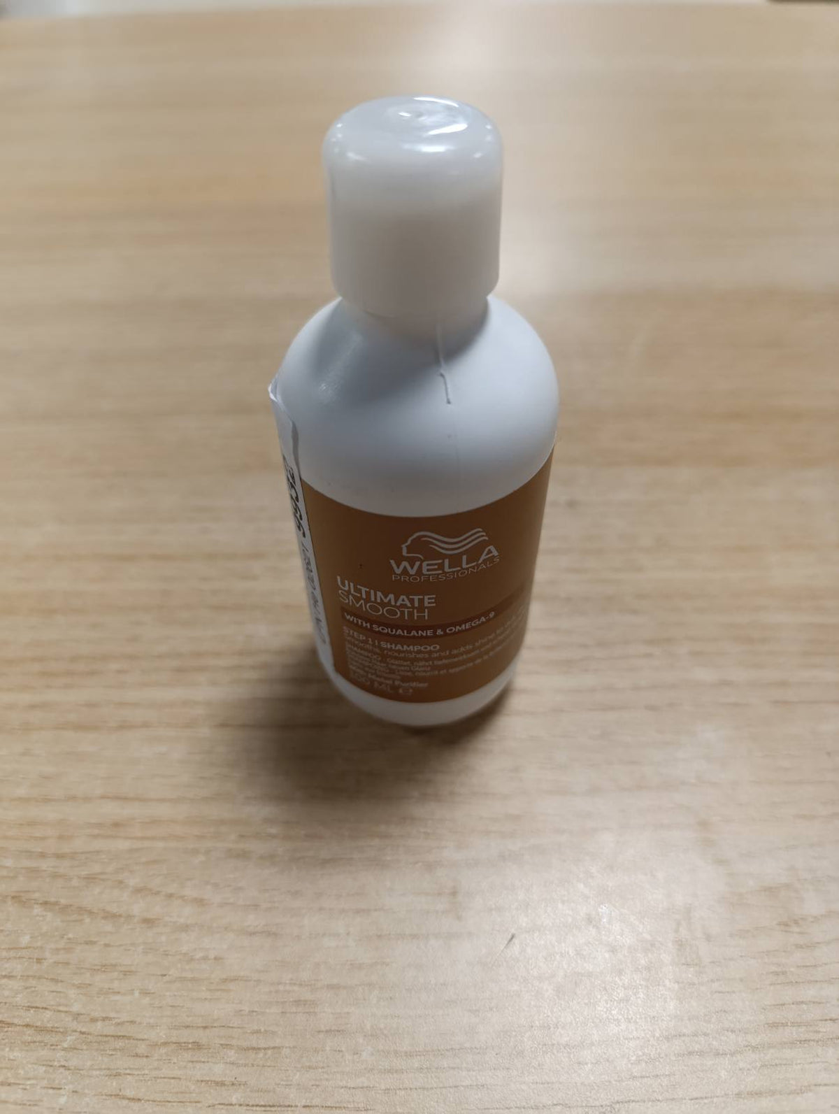 318325 - WELLA PROFESSIONALS Ultimate Smooth, 100 ml, shampo ushqyese me skualan dhe omega-9 për flokë të thatë