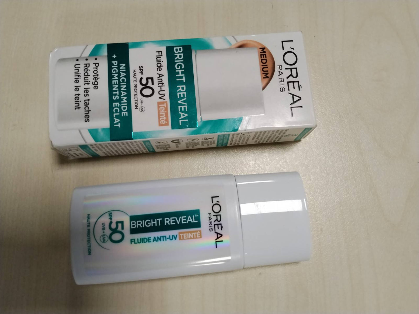 317609 - L'OREAL PARIS - Lëng Anti-UV SPF50 - 50 ml - Nuanca: Mesatare