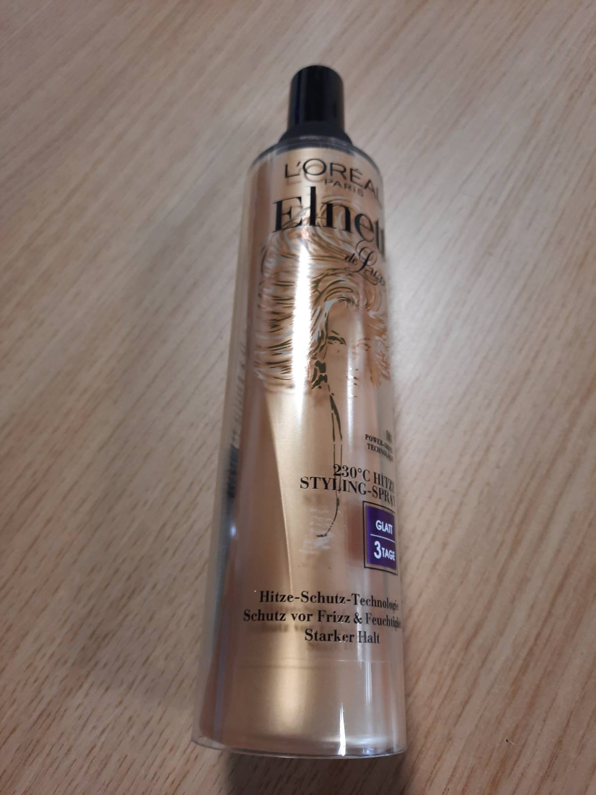 302616 - L'ORÉAL PARIS Elnett Ngrohës Styling Spray, llak flokësh me mbrojtje nga nxehtësia 230°C, kundër kaçurrelave, stilim afatgjatë - deri në 72 orë, kujdeset dhe zgjat stilimin e flokëve me kompleks termo-keratinë, 170 ml.