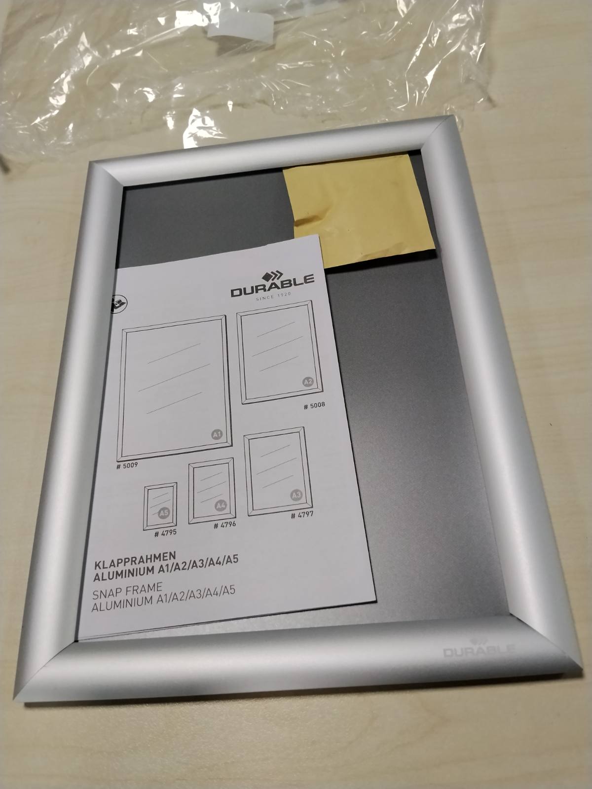 299897 - Kornizë palosëse alumini A4, set vetëngjitës + vida, 1 copë, e anodizuar argjendi, 479623