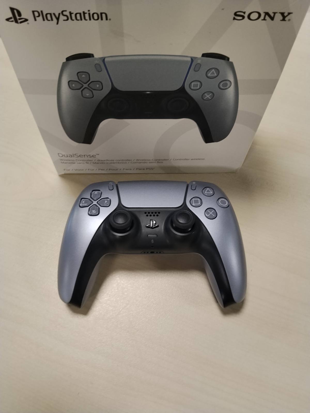 292247 - PLAYSTATION Kontrollues pa Tel DualSense®, Argjend i Pastër