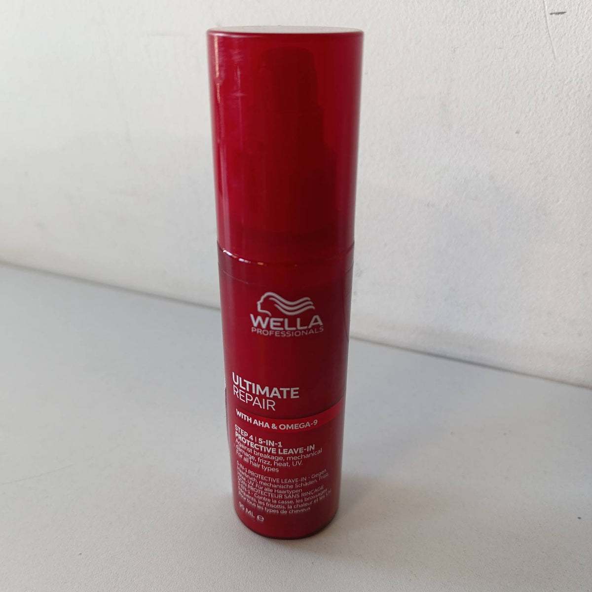 300803 - WELLA PROFESSIONALS Locion pa shpëlarje Ultimate Repair, 95 ml, Mbrojtje kundër dëmtimit të flokëve