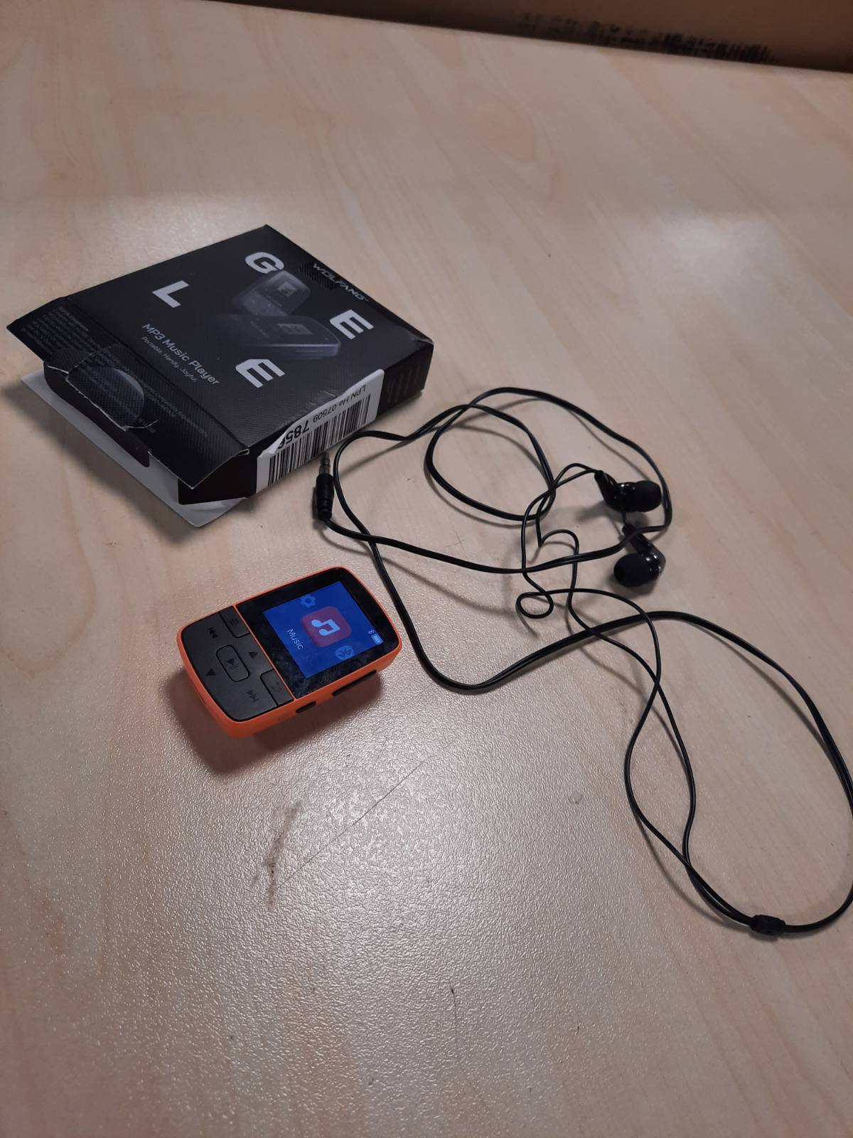 273403 - WOLFANG MP3 PLAYER me Bluetooth 5.2, Sport Clip, Madhësi Mini, Pesha 28.3 g, Radio FM HiF, Regjistrues Zëri, Kufje të Përfshira, Portokalli