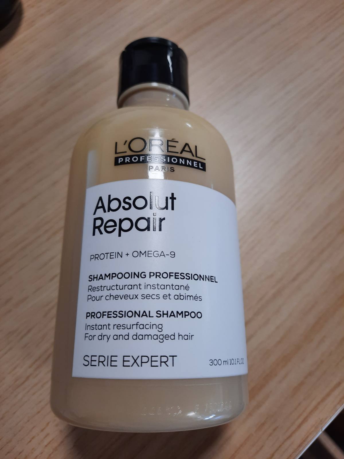 275447 - L'OREAL PROFESSIONNEL Shampo ristrukturuese e menjëhershme Absolut Repair, 300 ml, për Burra dhe Gra, 77% më pak dëme, 7 herë më shumë shkëlqim