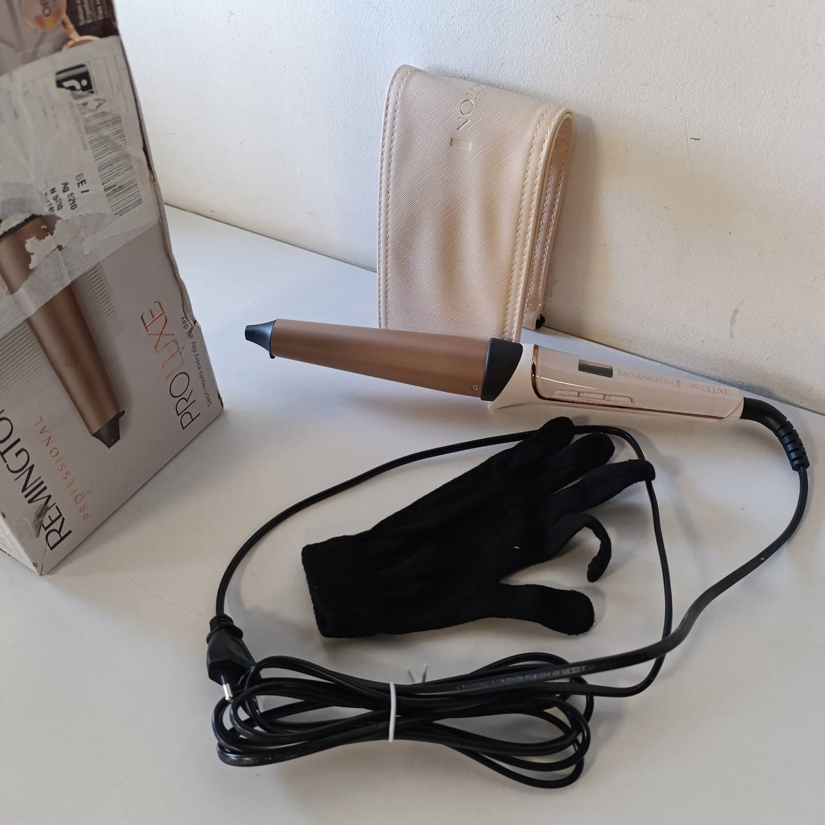 315907 - REMINGTON Hekur kaçurrelash PROluxe Digital, 25-38 mm, Teknologjia OPTIheat, Veshje qeramike Grip-Tech, Ekran LCD 120-210°C