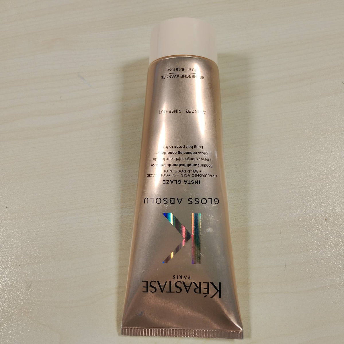 296902 - KERASTASE Gloss Absolu - Balsam shkrirës Insta Glaze, 250 ml, acid hialuronik, acid glikolik, për flokë të gjatë, të prirur ndaj fërkimit.