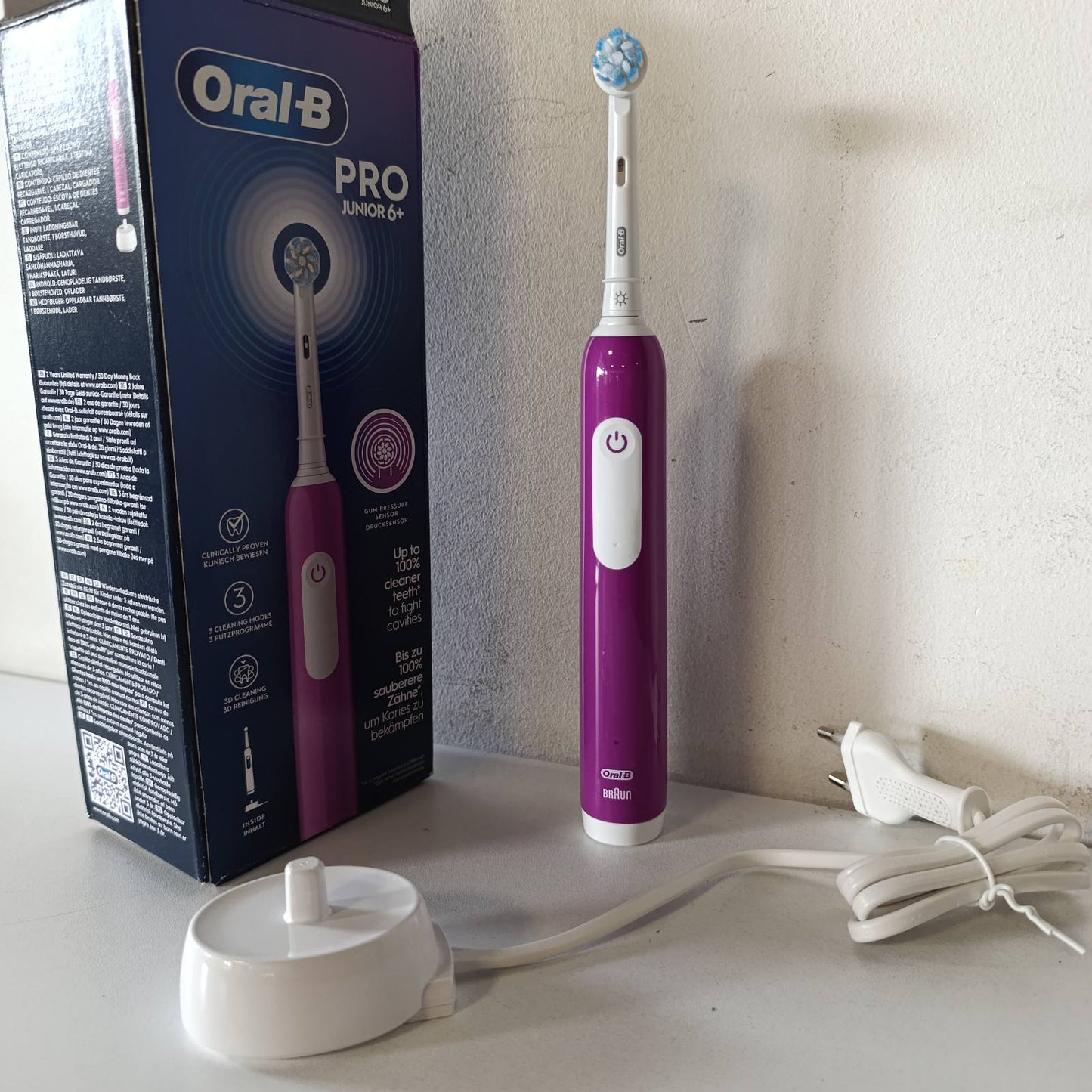 275175 - ORAL-B Furçë dhëmbësh elektrike Pro Junior për fëmijë, 1 kokë furçe, vjollcë, 3 mënyra larjeje, filamente të buta, kontroll i presionit të mishrave të dhëmbëve, për moshën 6+ vjeç