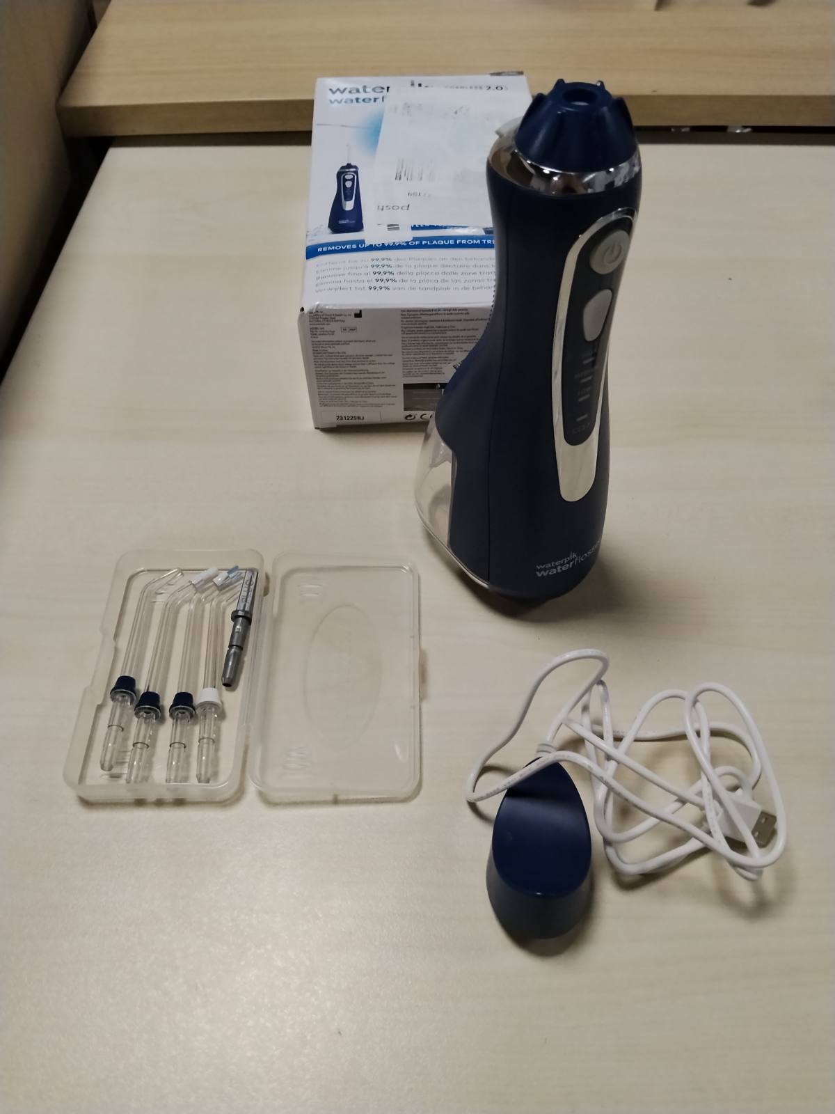 307161 - Waterpik Pastrues uji pa tel Advanced, Teknologji Precize Pulsi, heqje deri në 99.9% të pllakës, 4 koka furçe, 3 mënyra, sistem karikimi me induksion, blu
