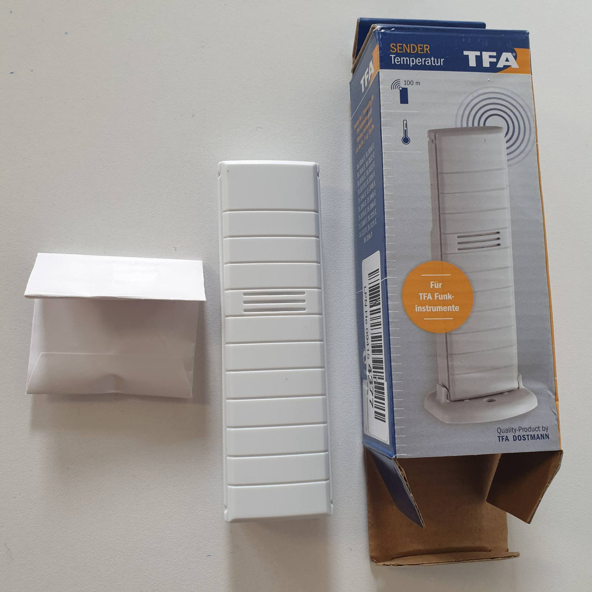 314582 - TFA DOSTMANN Transmetues temperature 30.3147.IT, transmetim pa tel, Gjatësia 39 (51) x Gjerësia 22 (46) x Lartësia 129 (135) mm, e bardhë