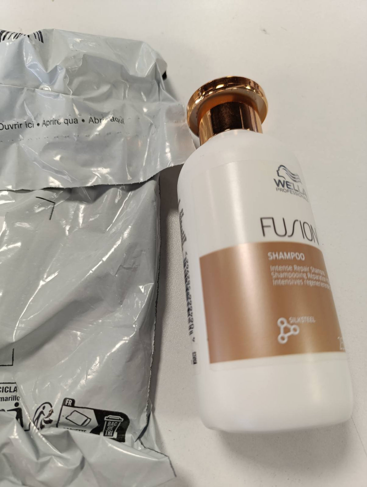 302344 - WELLA PROFESSIONALS Shampo Fusion Intense Repair, 250 ml, për flokë të thatë dhe të dëmtuar