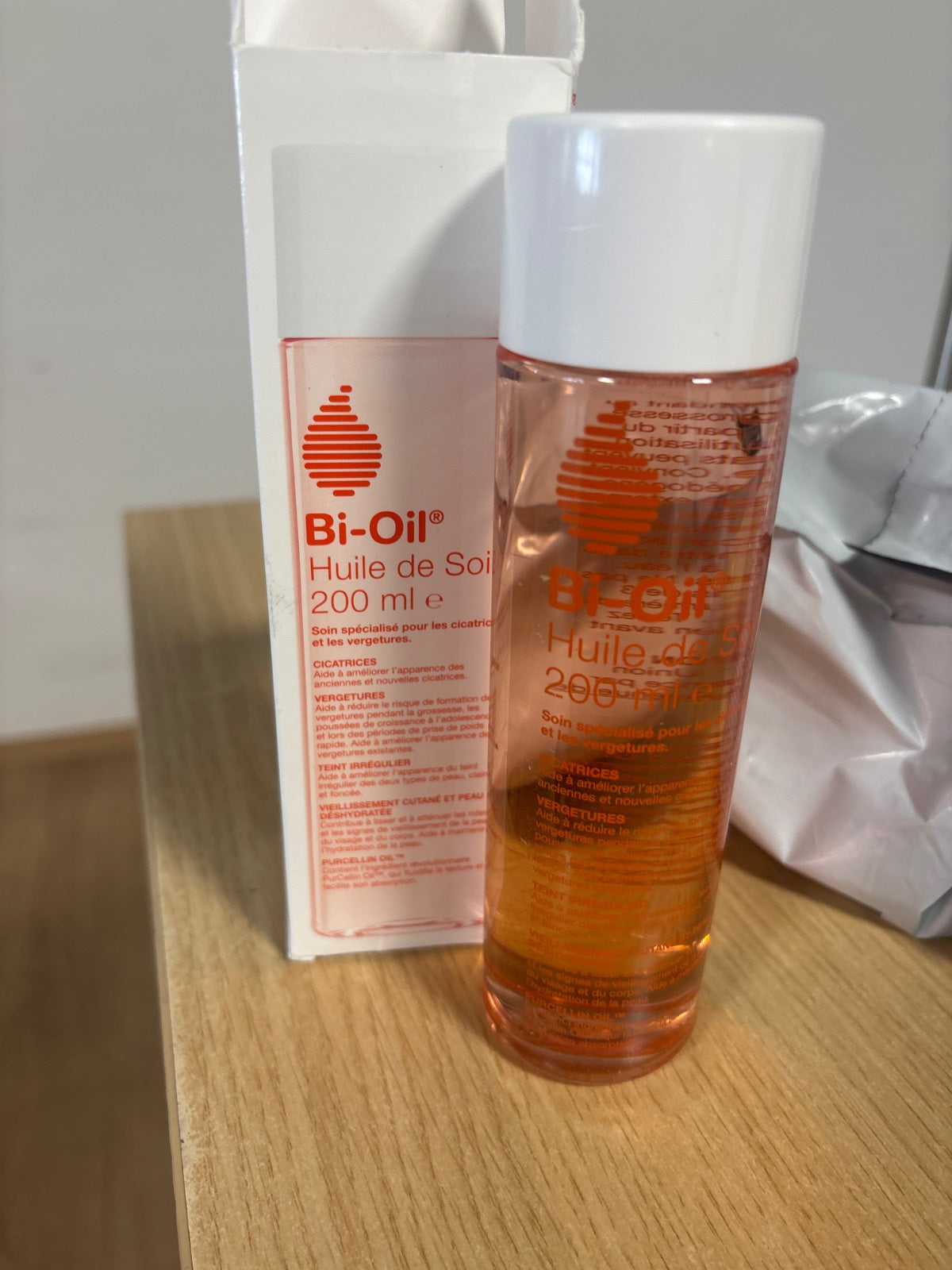 303085 - BI-OIL Vaj për Kujdesin e Lëkurës, 200 ml, për shenjat e strijeve, lëkurën e thatë dhe pabarabartë