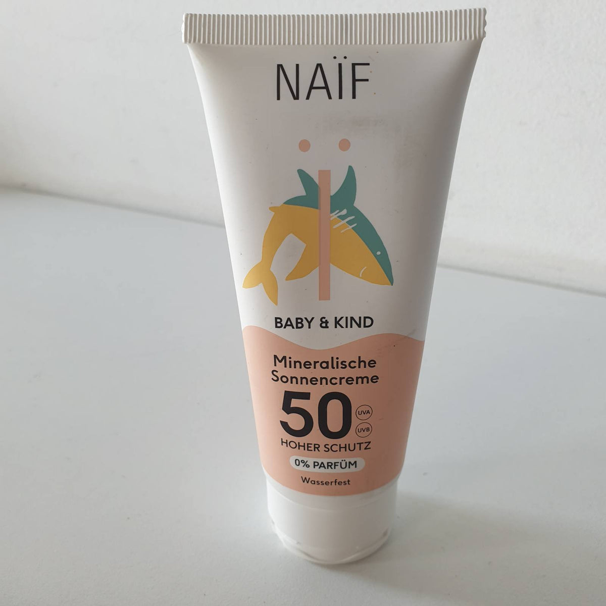 297272 - NAÏF Krem dielli mineral për foshnje dhe fëmijë, SPF 50, 100ml, mbrojtje nga rrezet UVA dhe UVB, rezistent ndaj ujit