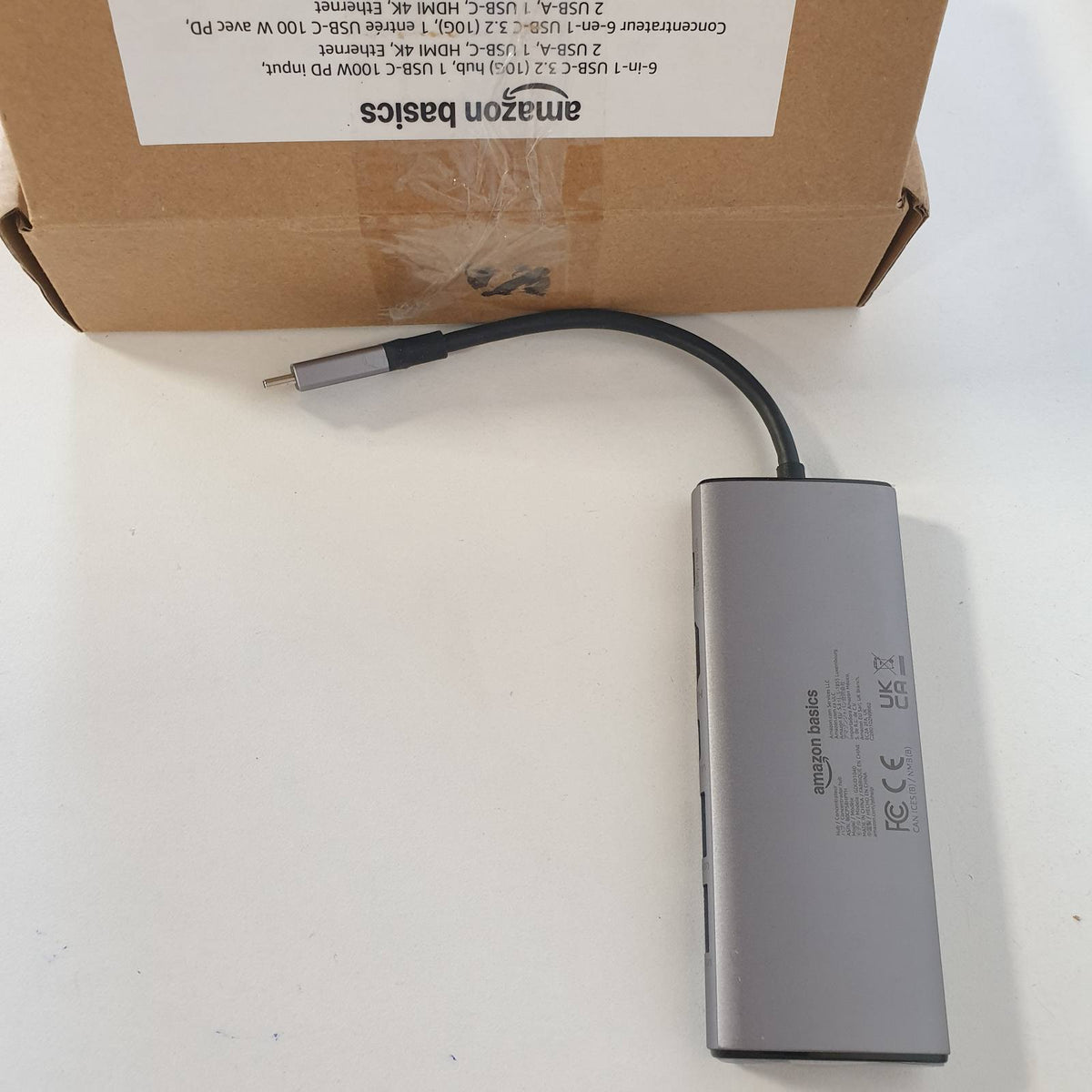 309024 - Amazon Basics - Hub 6-në-1 USB-C 3.2 (10G), 1 Hyrje USB-C 100W PD, 2 USB-A, 1 USB-C, HDMI 4K, Ethernet, 11.94 x 4.6 x 1.5 cm