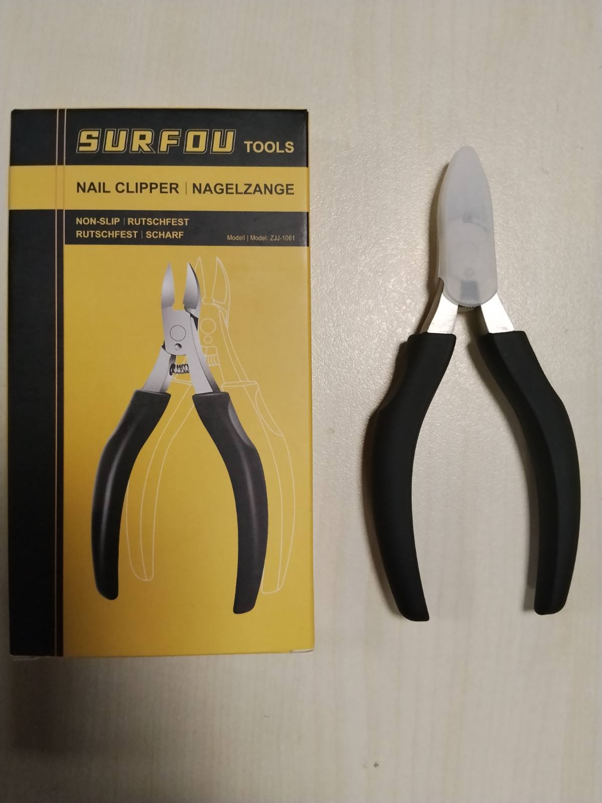 312240 - SURFOU Prerëse thonjsh prej çeliku inox, Prerëse profesionale për thonj të rritur nën lëkurë dhe të trashë, me heqës të lëkurës së vdekur, dorezë që nuk rrëshqet dhe kapak sigurie
