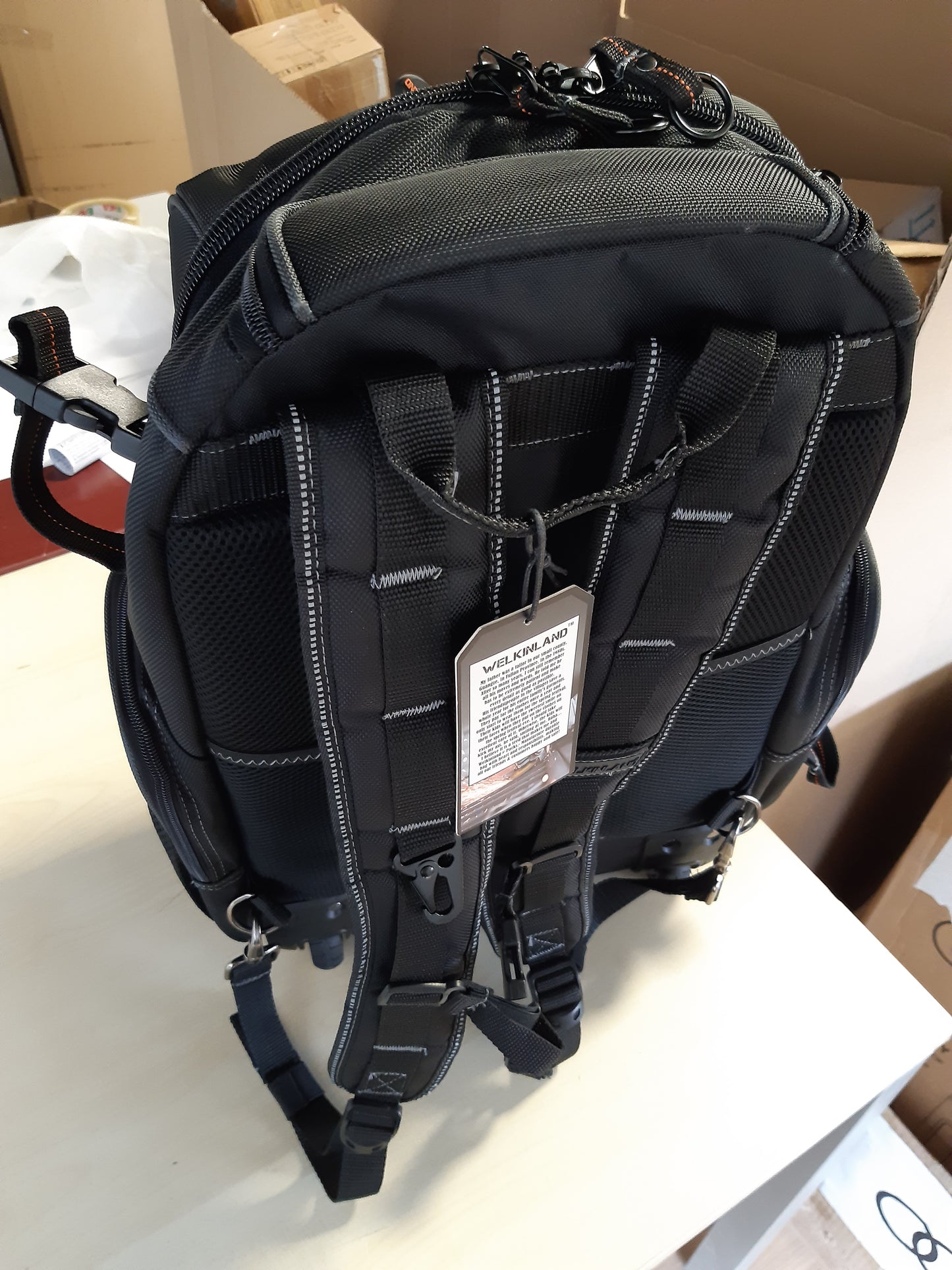 191089 - DEWALT Çantë Shpine për Vegla me Rrota, 72 Xhepa, Madhësi L, për Elektricistë, Material i Zi dhe Portokalli