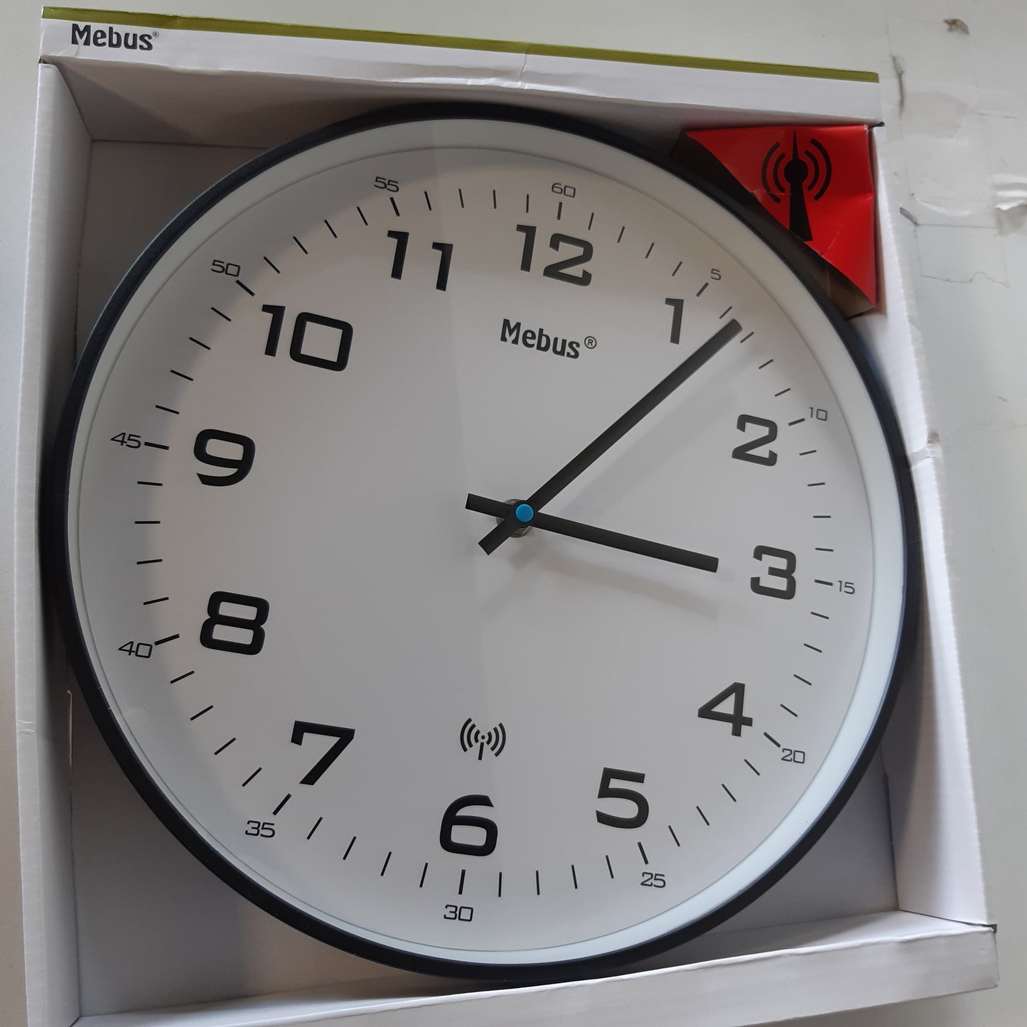 257092 - MEBUS Orë muri me radio të kontrolluar, 30 cm, e heshtur, kornizë e zezë, ekran i bardhë, modeli 13079