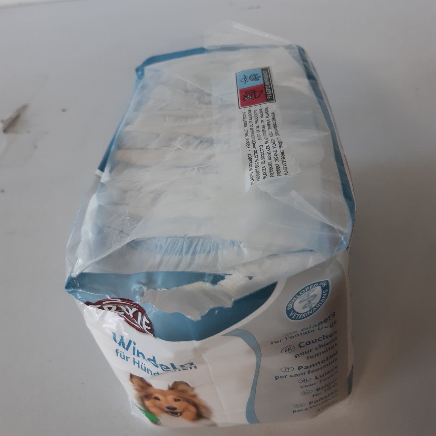 216769 - TRIXIE Pelena për Qen Femra Madhësia SM - Pelena thithëse për qen për mosmbajtje dhe nxehtësi - 12 copë me brez elastik për më shumë rehati, perimetër beli 28-40 cm - 23632