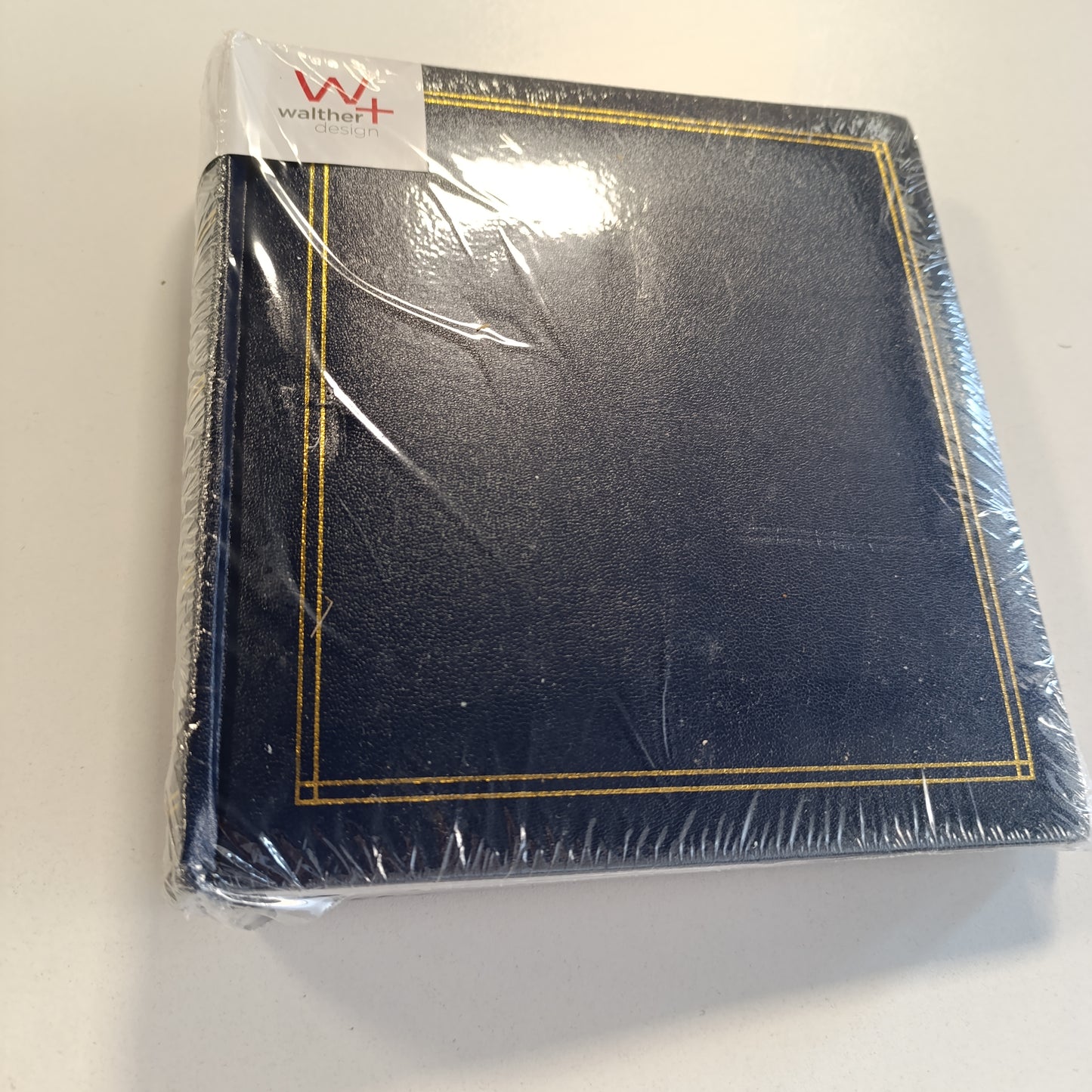 185136 - WALTHER DESIGN Albumi i Fotosh të Blutë Monza ME-138-L për 200 Foto 10x15cm, me Futje Memorash, Lёkurё Faux me Stampim