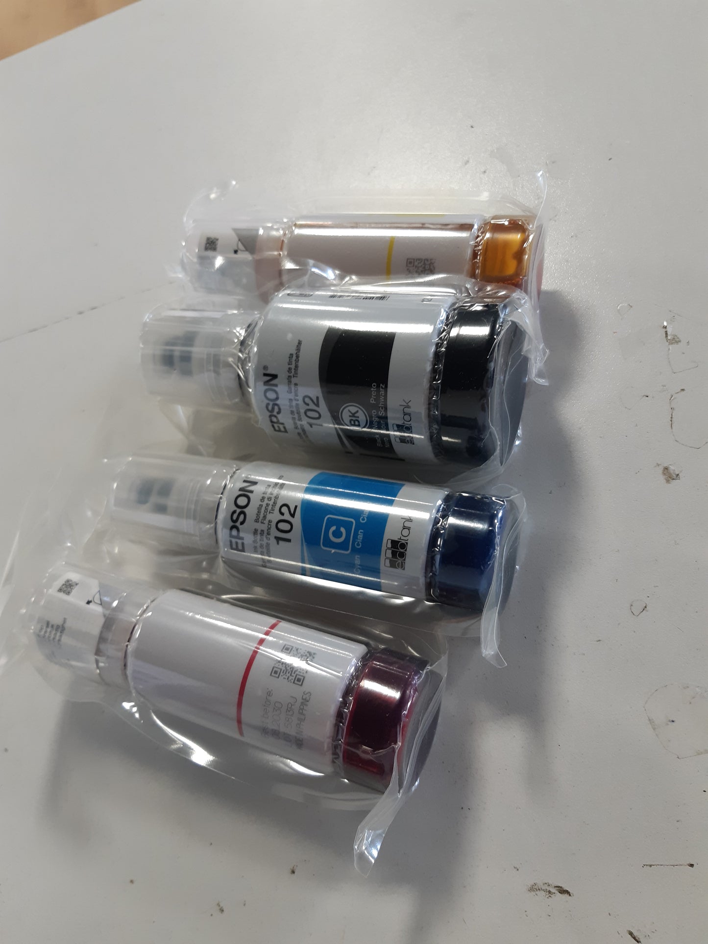 268180 - EPSON Shishe boje origjinale EcoTank Seria 102 - 4 ngjyra: E zezë, cian, magenta dhe e verdhë