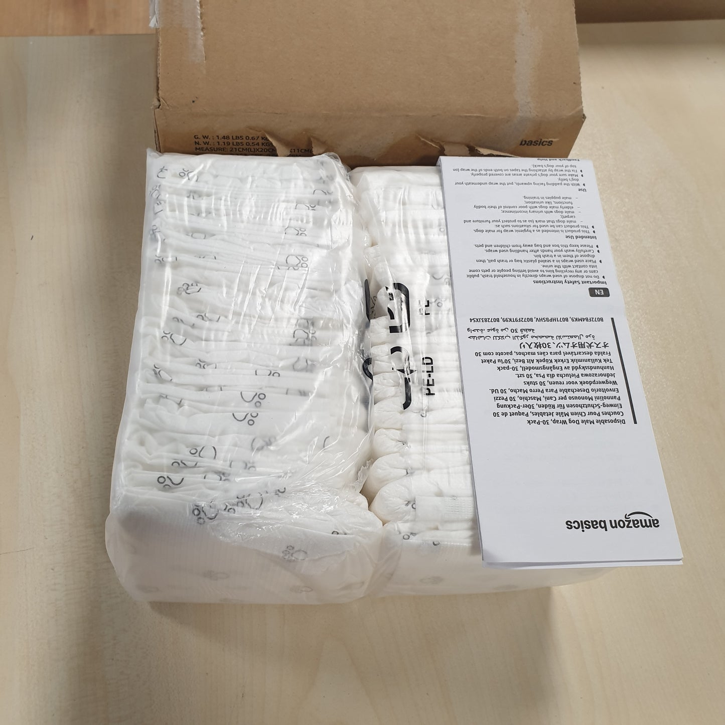 233319 - AMAZON BASICS Pelena për qen meshkuj, Madhësia XS, të bardha, 30 copë