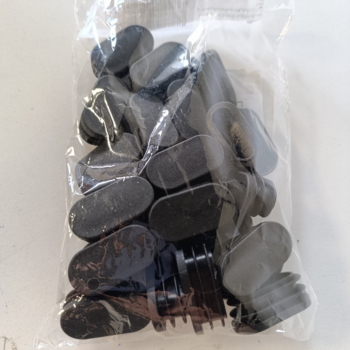 198921 - 25 Kapakë Këmbësh Karrige nga PLASTIK, për Mobilje, Tuba Ovalë 20x40 mm, IDEAL për Karrige Kopshti dhe Tavolina Ovale