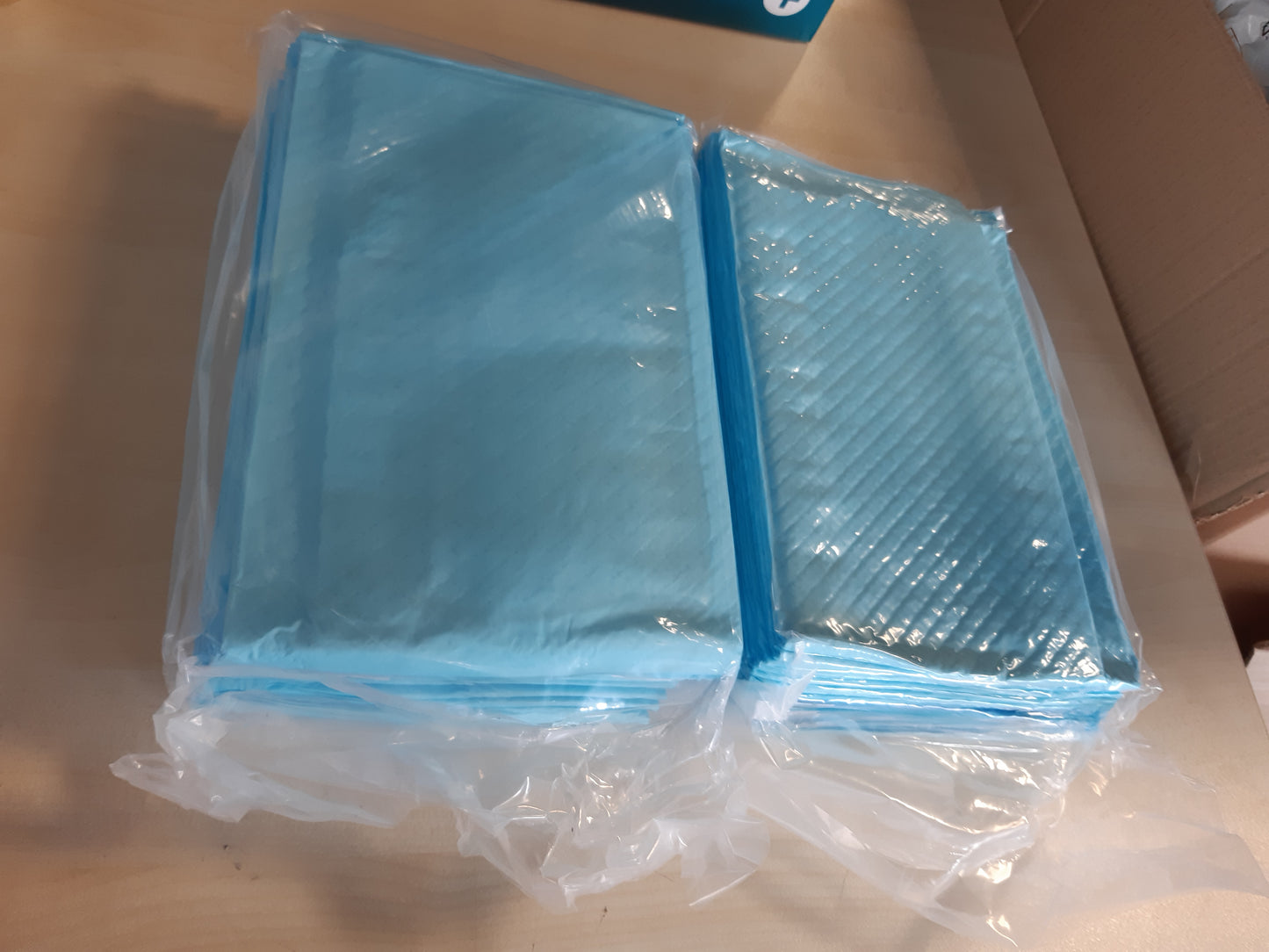 215346 - AYDMED peceta për mosmbajtje urinare 90 x 60 cm, me shirita ngjitës, kapacitet 1200 ml