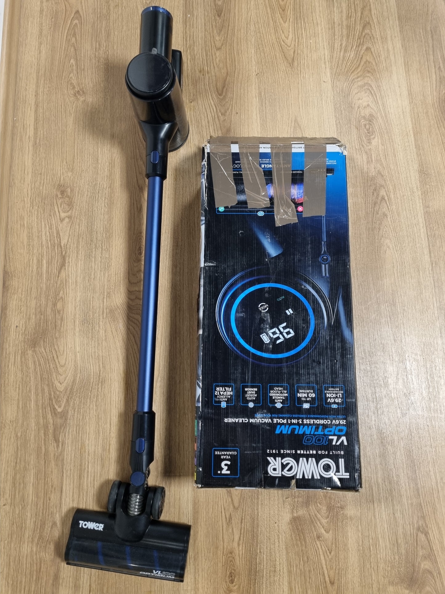 94201 - FSHESË TOWER T513012AT VL100 OPTIMUM - Fshesë pa Tel, me 3 Shtylla dhe Filtër HEPA 12, Rezervuar Pluhuri 1L, Fuqia Shtypëse 11Kpa, Tensioni 29.6V, Blu e Errët dhe e Zezë