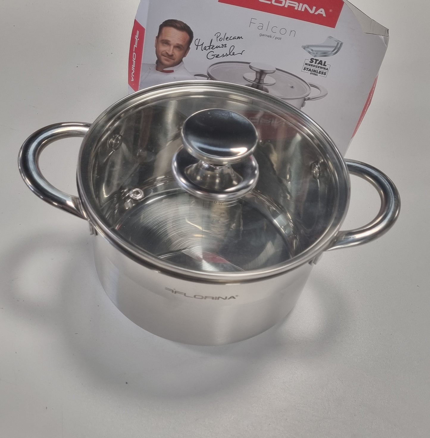 222434 - FLORINA Tenxhere çeliku inox, 2.5 l, 18 cm Diametër, me kapak qelqi, bazë me 3 shtresa