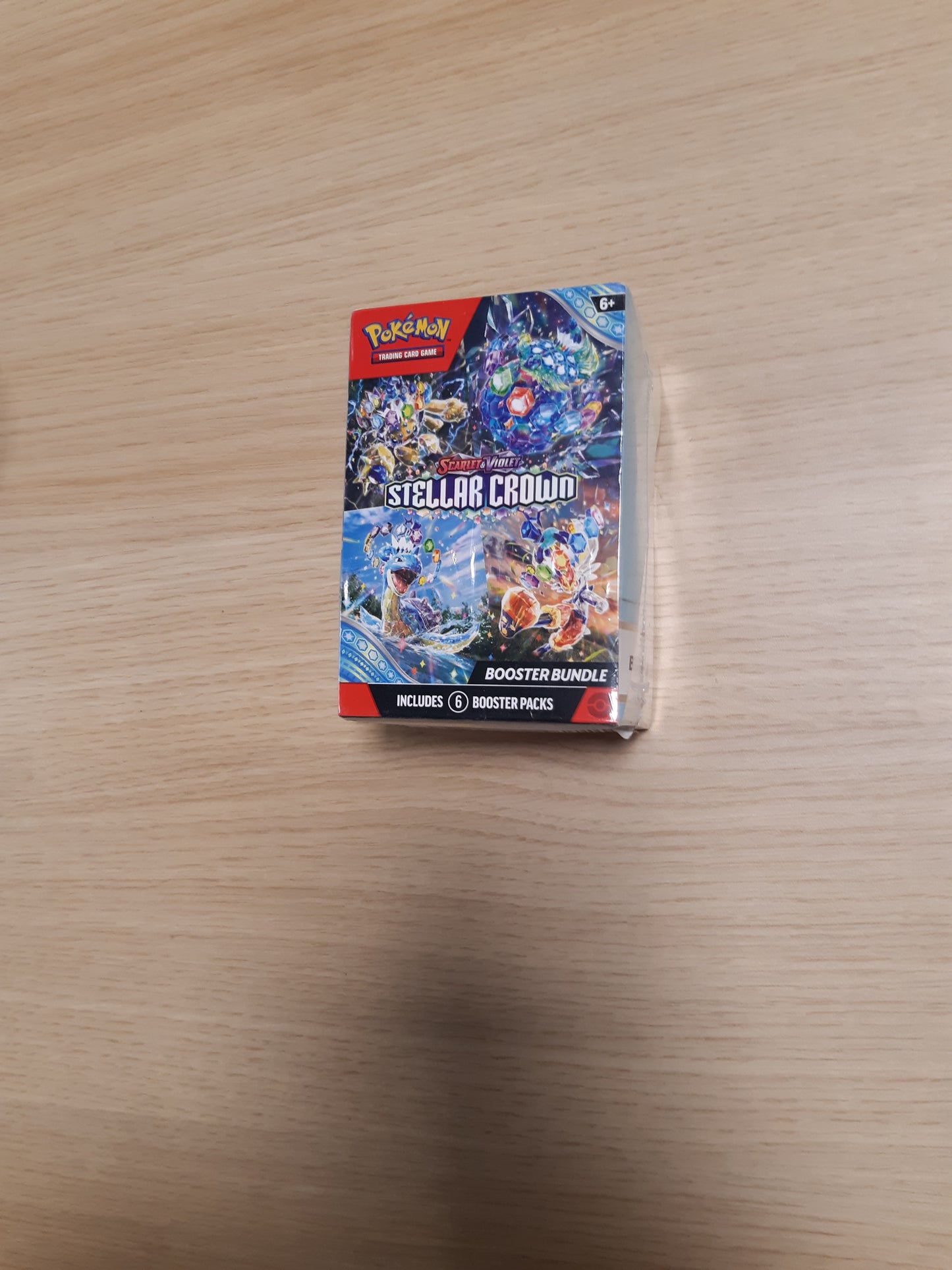 14640 - Pokemon TCG: Scarlet & Violet—Pako Përforcuese e Kurorës Yjore (6 Paketa Përforcuese)