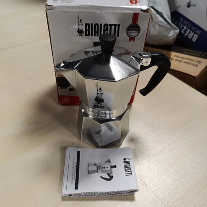 196207 - BIALETTI - Makinë Ekspreso për Soba Moka Express, Përgatit Kafe Italiane Autentike, Kapaciteti 3 Gota (130ml), Materiali Alumin, Ngjyra Argjend