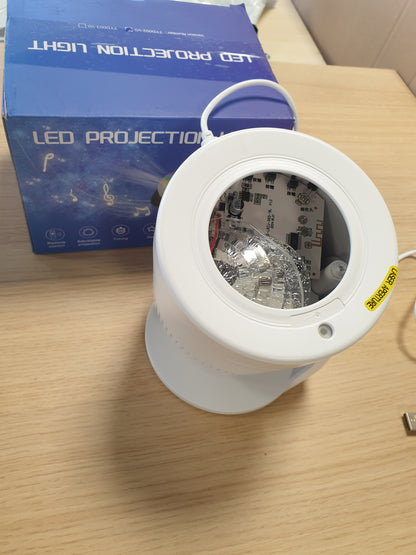 257781 - PROJEKTOR QIELLI ME YJE, LED AURORA BOREALIS, I RREGULLUESHËM 180°, 33 KOMBINIME MJEGULLNAJASH ME MUZIKË BLUETOOTH, KOHËMATËS DHE TELEKOMANDË, PËR DEKORIM DHOME/FESTE/KINEMA NË SHTËPI, I BARDHË