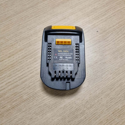 266629 - MILWAUKEE MIL18DL për adaptor baterie në Dewalt (konvertues për baterinë Milwaukee M18 në veglat elektrike Dewalt 20V)