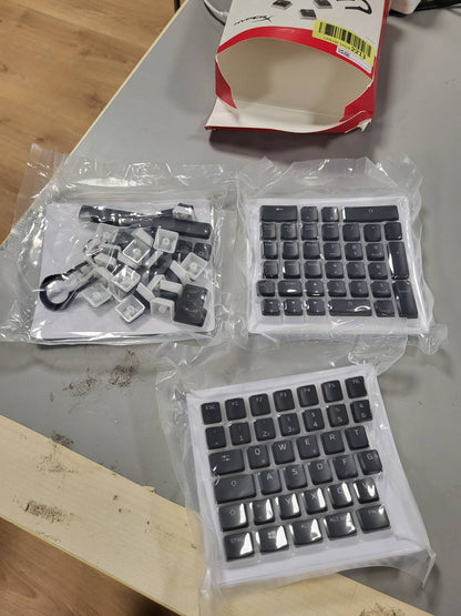 268594 - HYPERX Tastiera Pudding, Ndriçim RGB, QWERTZ Gjermane, e pajtueshme me tastierat HyperX dhe mekanike për lojëra, E zezë dhe e bardhë