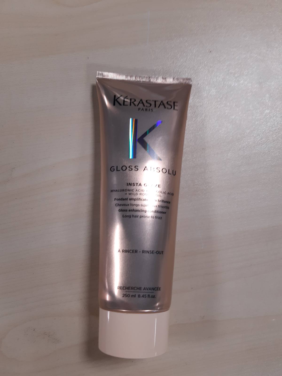 271414 - Kérastase Balsam Gloss Absolu për flokë të çrregullt, 250 ml, me acid glikolik, acid hialuronik dhe vaj trëndafili të egër