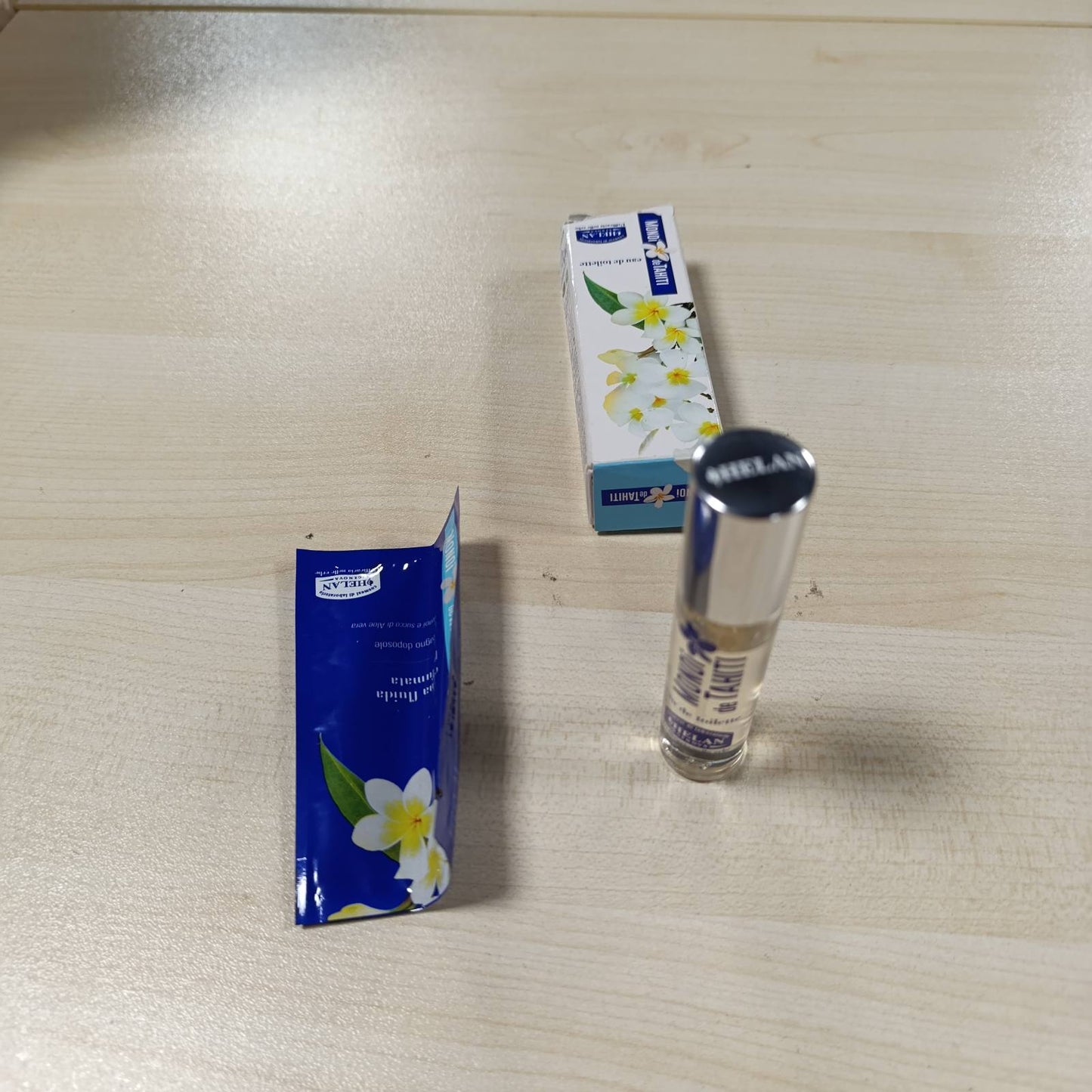 272347 - HELAN Monoi de Tahiti - Parfum për femra me aromë lulesh, 10 ml, Ujë tualeti me aromë kokosi, lule tiare, nota jasemini dhe qelibar, aromë vaniljeje të ëmbël